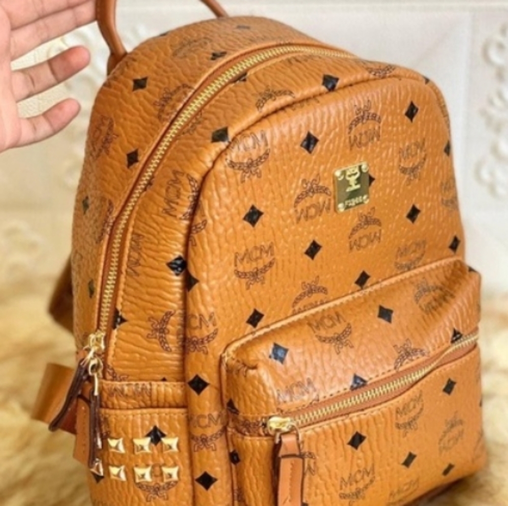 MCM mens Brown Stark 32 Outline Studs Visetos Backpack